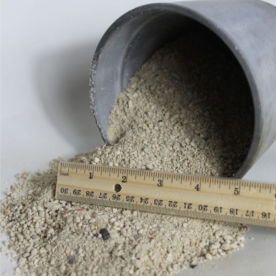 A-3 Sand spilling out of pot and compared to a ruler