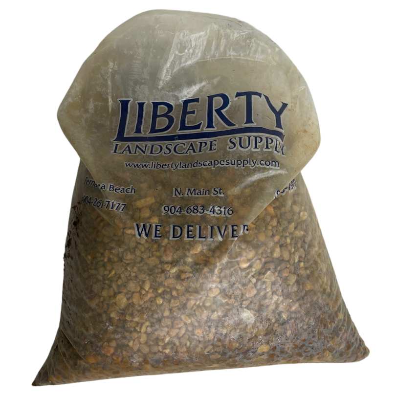 brown pea gravel in a liberty landscape supply bag