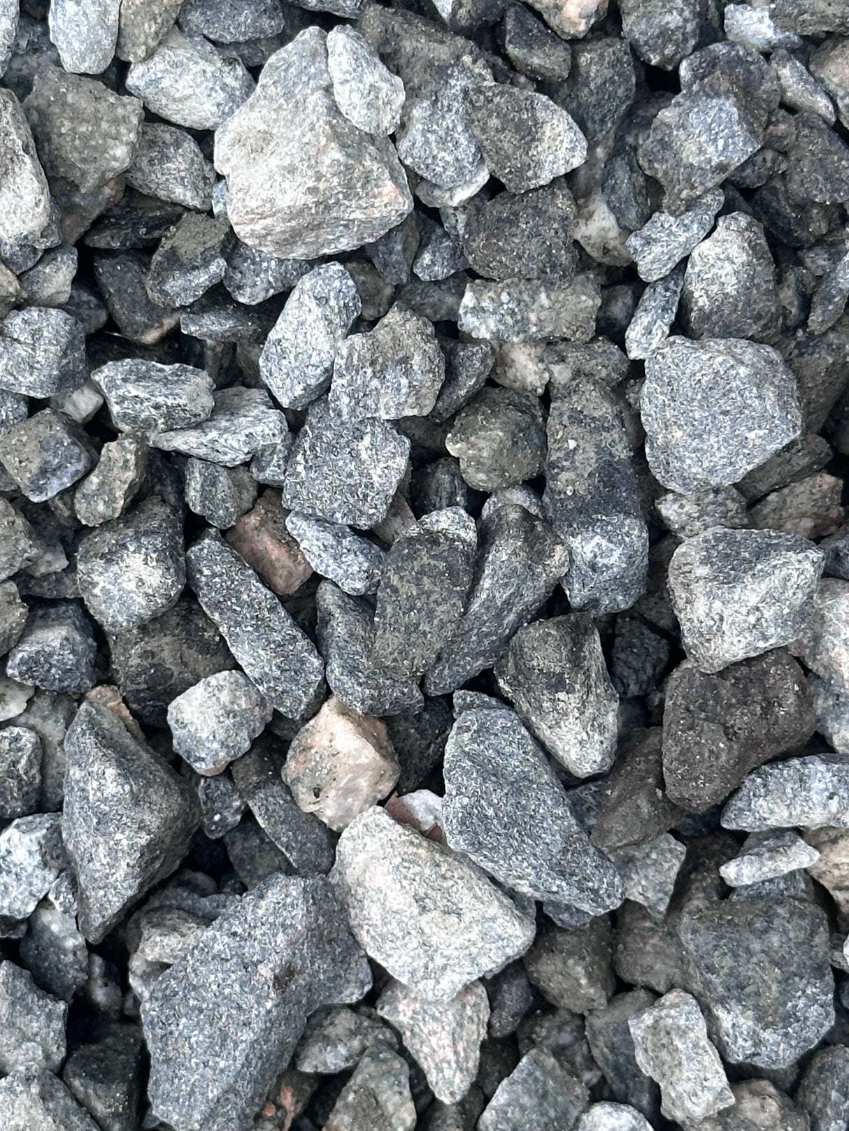 up close of granite rock showing different shades