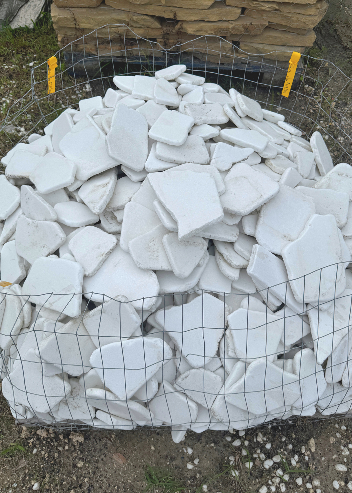 Stack of tiles in a wire cage at Liberty Landscape Supply