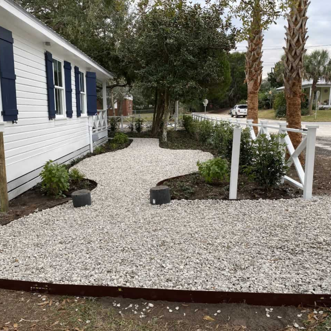 medium shell making up path on side of house