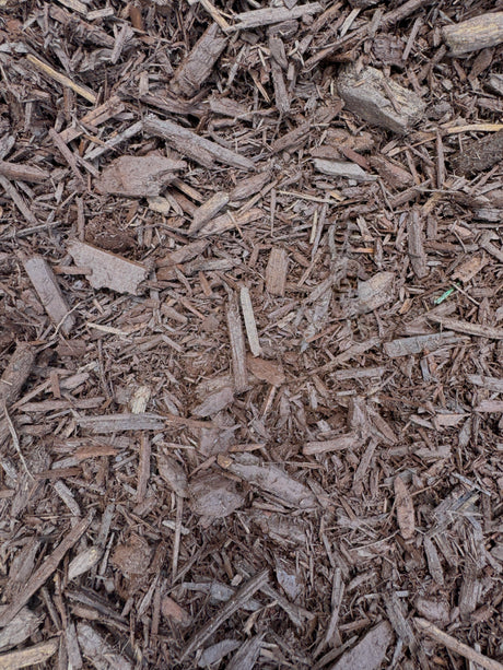 chocolate brown mulch in pile