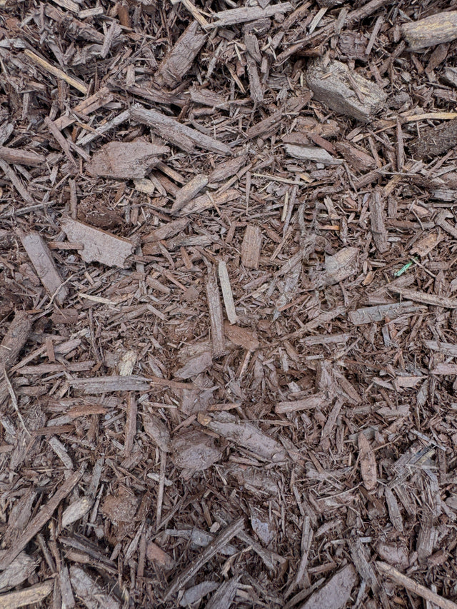chocolate brown mulch in pile