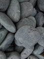 Close-up of gray stones with a focus on texture and color.