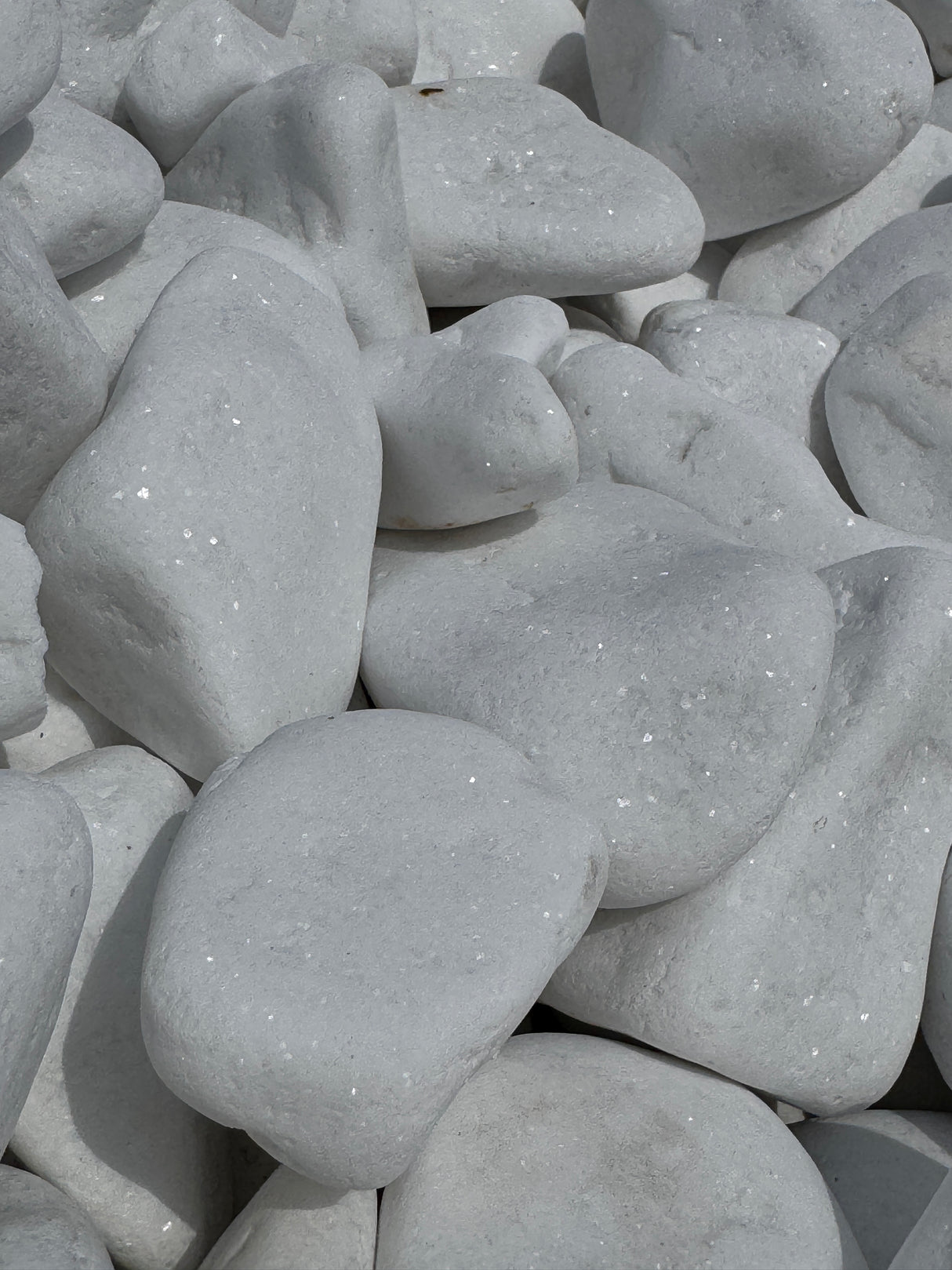 Close-up of white stones with a focus on texture and color.