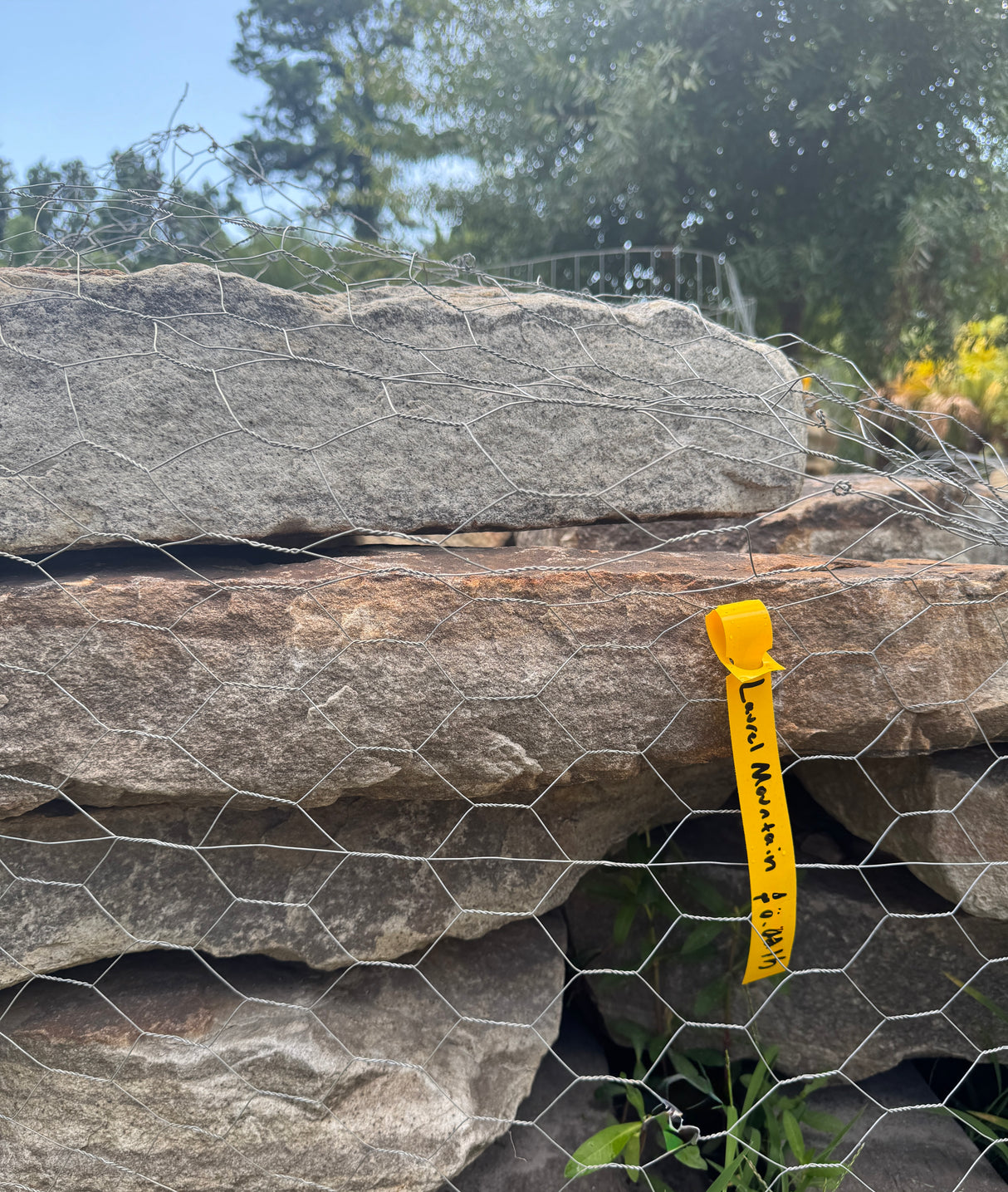 stack of thick, irregular, pathway stone tagged Laurel Mountain 