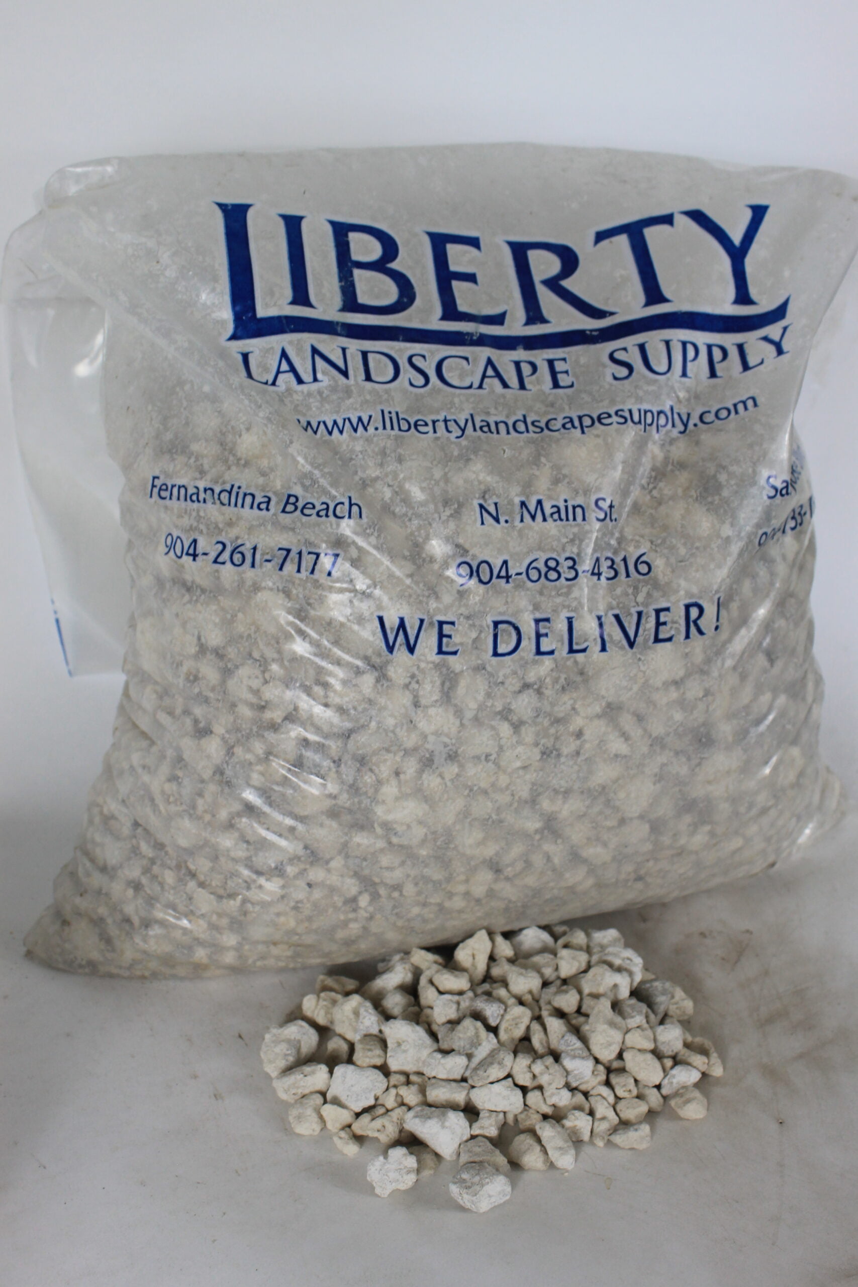 https://www.libertylandscapesupply.com/wp-content/uploads/2022/06/llimestone-bag-scaled.jpg